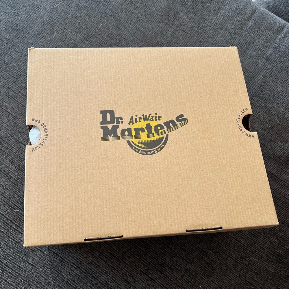Brand new Dr Martens black boots. Size 4 men 5 women.